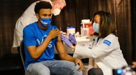A group of teenagers serving as 'Covid-19 Student Ambassadors' joined Governor Gretchen Whitmer to receive a dose of the Pfizer Covid vaccine at Ford Field.