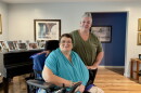 at Rodriquez's home in Buffalo, New York on September 21, 2026. Rodriquez, a Consumer Directed Personal Assistance Program (CDPAP) consumer is supportive of Eaton, her worker and friend, taking part in 1199 SEIU's unionization efforts.