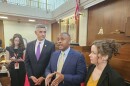 House Democratic Leader Robert Reives, center, addresses reporters after the June 26, 2025, session with Reps. Brian Turner and Lindsey Prather.