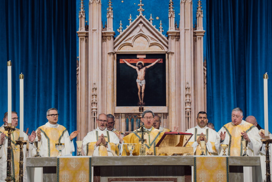 Cardinal Luis Antonio Tagle, center, celebrates the beatification Mass for the late Archbishop Fulton J. Sheen surrounded by bishops and archbishops on Thursday.