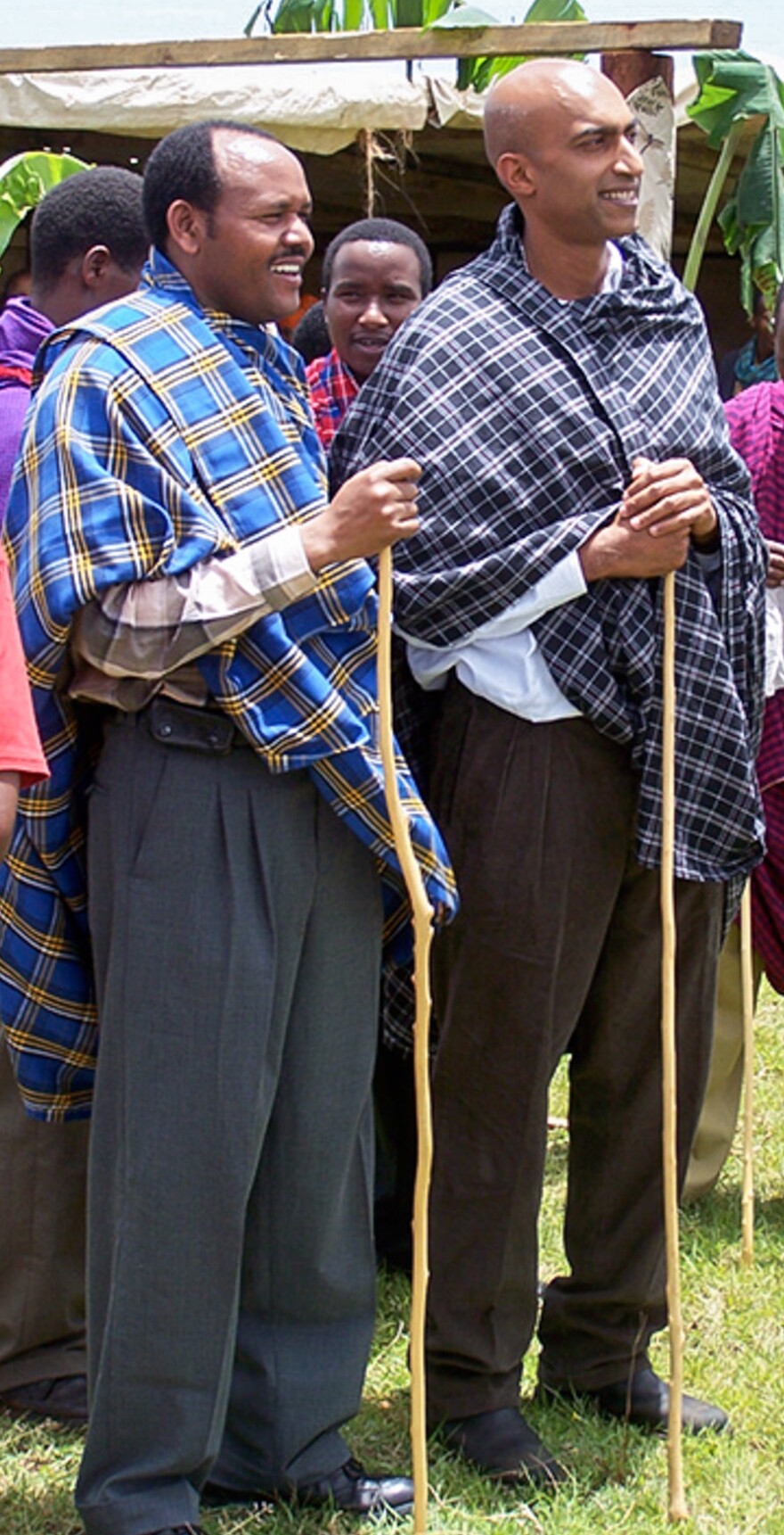 Emmanuel Mayegga of Tanzania, left, was not yet a doctor when Dr. Dilan Ellegala taught him to perform brain surgery.