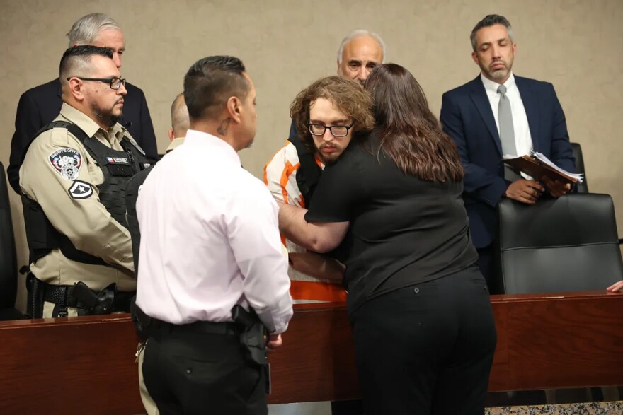 Adriana Zandri, right, hugs the mass killer who murdered her husband, Ivan Filiberto Manzano, at the conclusion of the second day of victim impact statements in District Judge Sam Medrano’s courtroom. Crusius pleaded guilty Monday to capital murder and aggravated assault charges for killing 23 people and wounding 22 others at an El Paso Walmart on Aug. 3, 2019. (Ruben R. Ramirez)