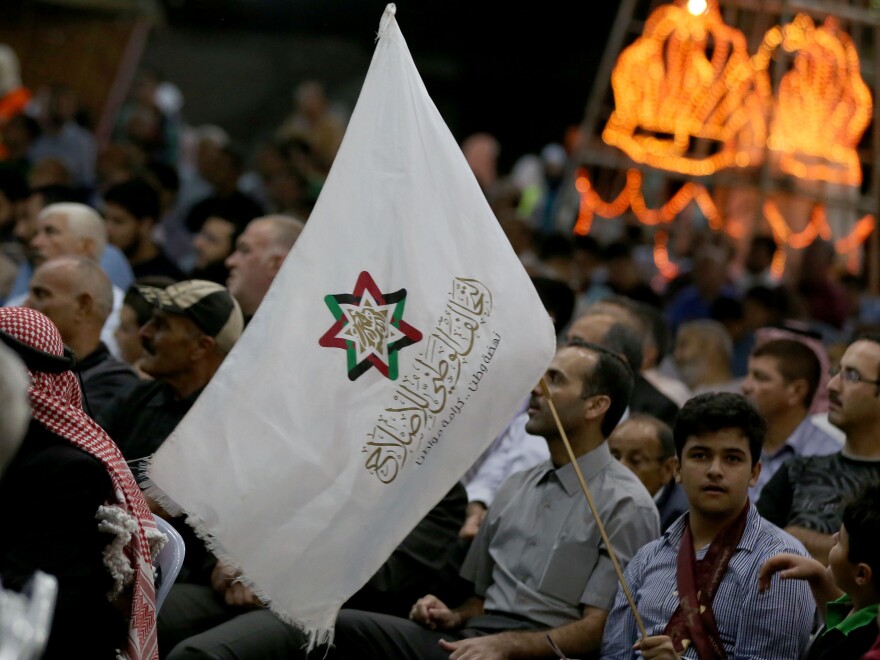 Supporters attend a gathering for Jordan's National Alliance for Reform, a political bloc including the Muslim Brotherhood, in Amman's Sweileh District last September. "In a lot of countries, we are in partnership with governments and parliament," says a brotherhood spokesman in Amman.