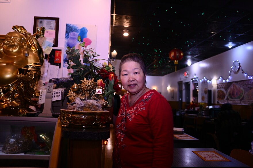 Ginny Cheung stands in her restaurant before the Chinese New Year celebration she hosts annually for students who celebrate Lunar New Year. Her customer base are from all parts of Asia and America, a perk of living in a college town, Cheung says.