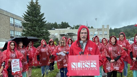Bargaining Unit President Bill Schneider leads a nurses rally outside the Adirondack Medical Center 