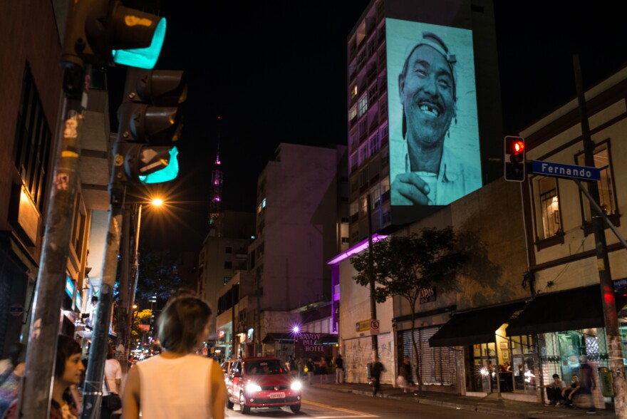 A portrait is projected on the walls of a building as part of a project promoting art through re-evaluating urban spaces and buildings in Sao Paulo, Brazil, on Nov. 22.