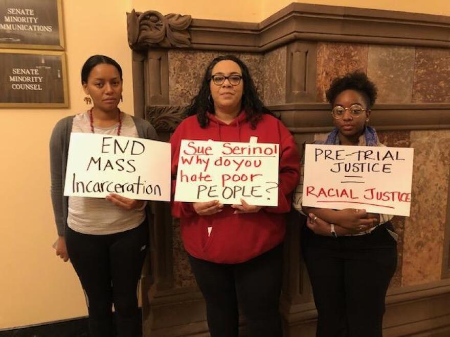 Amy Jones, center, of Citizen Action objects to the changes to the bail reform laws that Republican senators and law enforcement groups are proposing. KAREN DEWITT