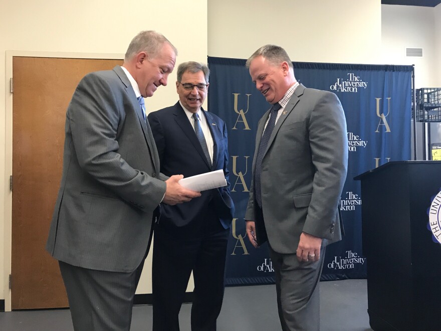 three men in suits