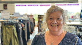 Carol Rose stands inside the WRC Thrift Store on U.S. 31 in Garfield Township. She's worked there for 40 years and is being honored by WRC for her many years of service. (Photo: Ed Ronco / IPR News)