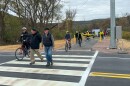 Bikers and hikers use a newly opened section of the Pine Creek Rail Trail in Wellsboro in October.