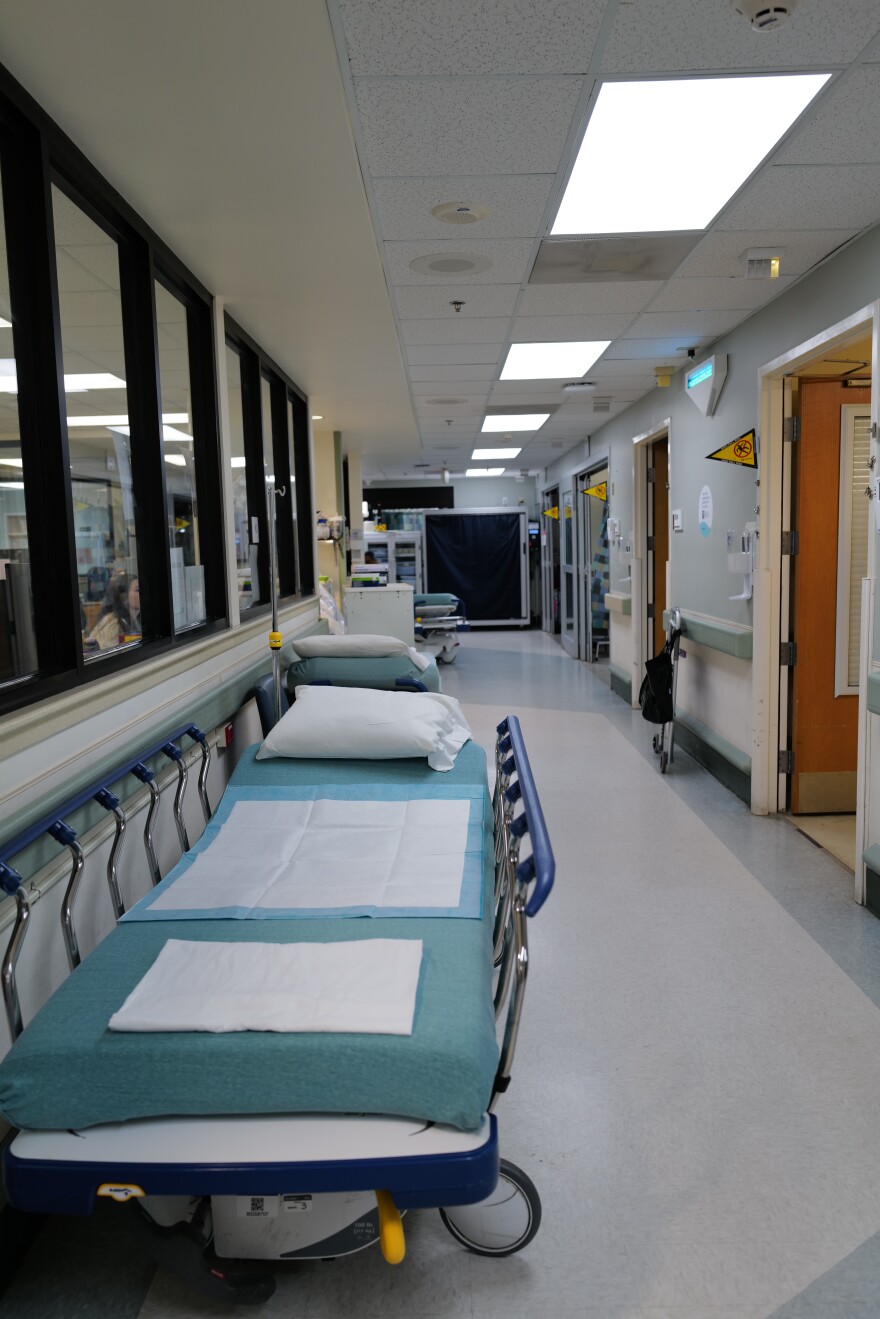 A stretcher sits in a hallway at Sentara Norfolk General Hospital’s emergency department in Norfolk. ER nurses, who make up a large share of the workforce in units like this, are among those most affected by noncompete agreements.