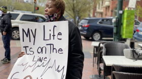 Yetta Timothy, a certified nursing assistant in Harrisburg, was among a small group of health care workers who showed up to counter-protest the larger April 20, 2020, rally urging the quick reopening of Pennsylvania's economy. Joseph Jaafari / PA Post