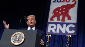 President Donald Trump speaks on stage during the first day of the Republican National Committee convention, Monday, Aug. 24, 2020, in Charlotte. (AP Photo/Evan Vucci)