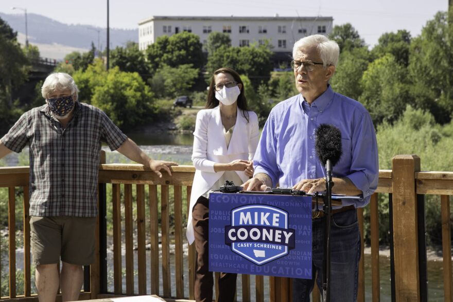 Gubernatorial candidate Mike Cooney announces his economic plan for the state during a July 30 press conference in Missoula. Todd Frank and Whitney Williams look on.