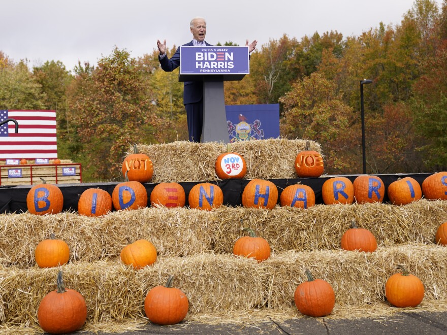 Democratic presidential candidate Joe Biden speaks at a campaign stop in Bristol, Pa. Appearances by him and his surrogates follow social distancing guidelines.