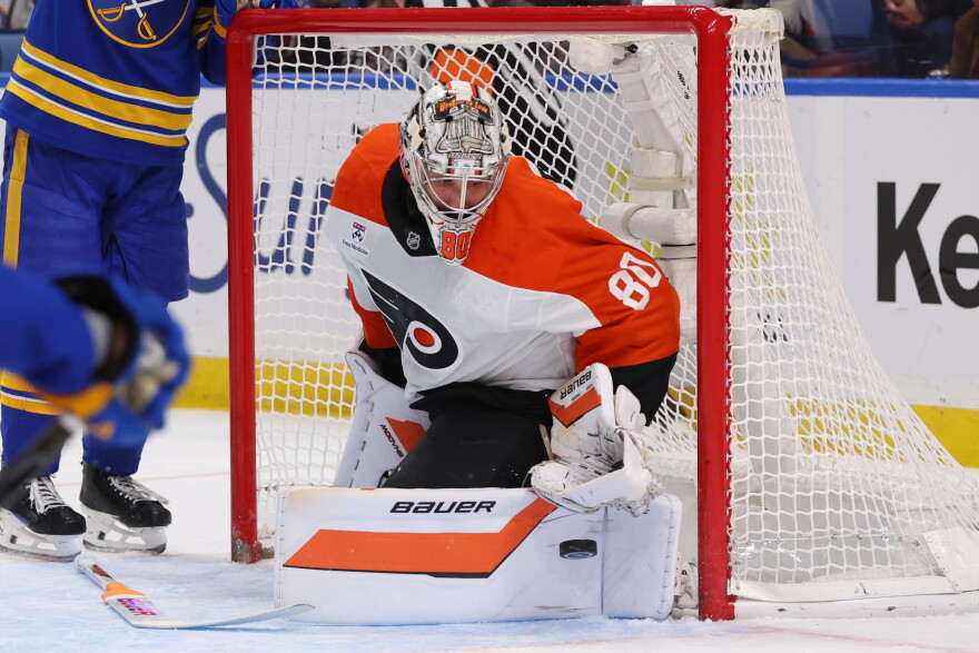 Philadelphia Flyers goaltender Dan Vladar (80) makes a pad save during the first period of an NHL hockey game against the Buffalo Sabres Wednesday, Oct. 21, 2026, in Buffalo, N.Y. (AP Photo/Jeffrey T. Barnes)