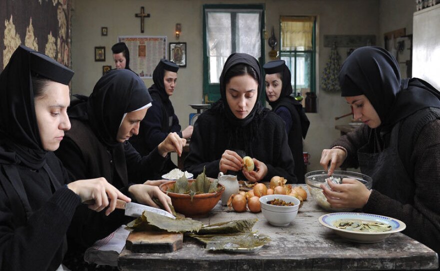 A group of nuns shares a meal in <em>Beyond the Hills</em>. Though the director is hesitant to underline metaphors in his film, contemporary observers won't find it hard to discover what seems like suggestive references to the Romania of dictator Nicolai Ceaucescu.