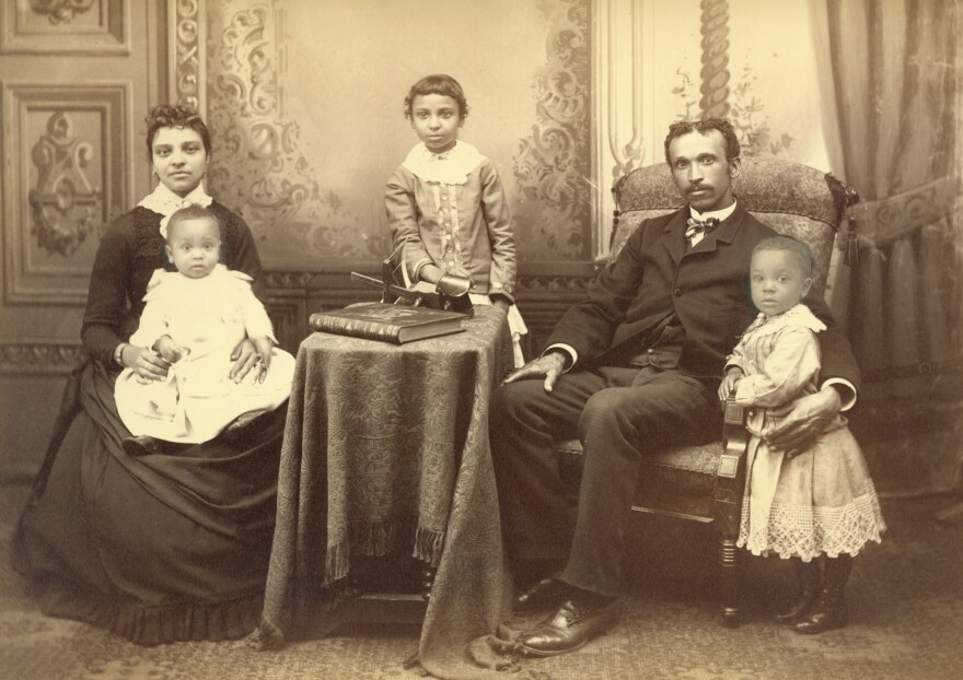 A portrait of John Johnson's family in 1886. They spent about 50 years in Midland, running a business, raising a family and engaging in the community.