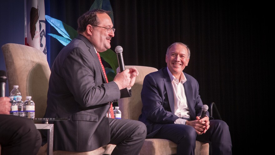 Republican Party of Iowa chair Jeff Kaufmann (left) talks with former Secretary of State Mike Pompeo at a fundraiser in Davenport on March 11, 2022.