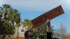 A sign asking for mercy at the protest in Lake Eola Park Jan. 29, 2025. The group stayed in the park for a little more than two hours.