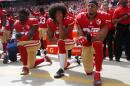 2BWGYBH Santa Clara, USA. 02nd Oct, 2016. Eli Harold (58), Colin Kaepernick (7) and Eric Reid (35) of the San Franciso 49ers kneel during the national anthem before a game against the Dallas Cowbowy on October 2, 2016, at Levi's Stadium, in Santa Clara, CA Credit: Nhat V. Meyer/Bay Area News Group/TNS/Alamy Live News
