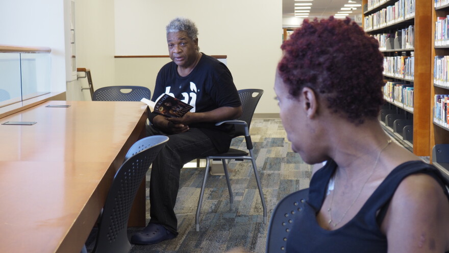 Andrew Stephens met Darlisha Moore at a Norfolk library when he overheard her talk about her experience chasing resources. He said he hasn't been able to find any either.