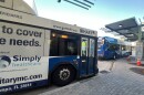 Two buses parked along the curb of the Marion Transit Center in Downtown Tampa