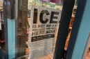 An anti-ICE sign hangs in the window at Evie's Bistro & Bakery.