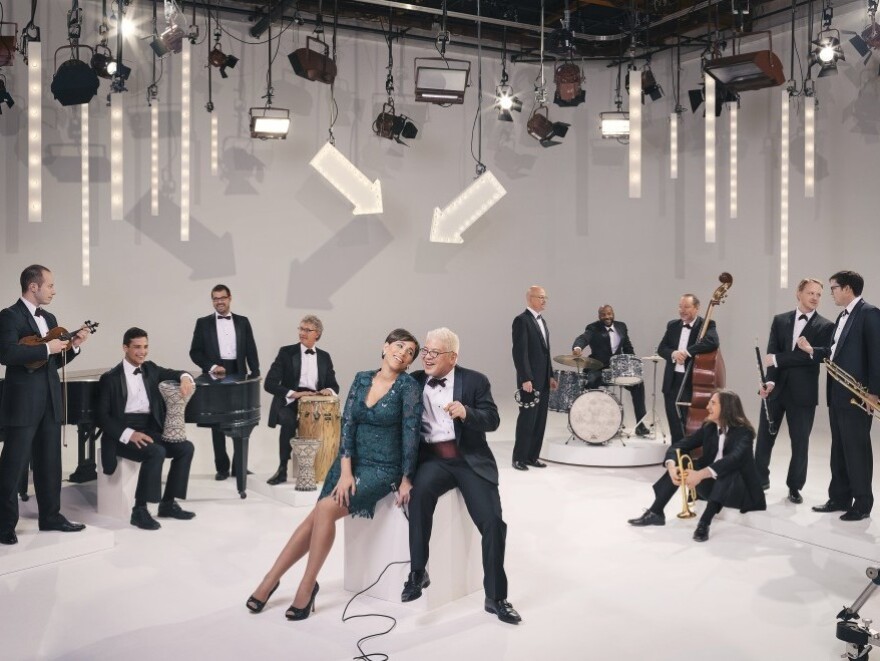Pink Martini band leader Thomas Lauderdale anchors the concert from his piano, with singers China Forbes, Storm Large, NPR's very own Ari Shapiro and more special guests.