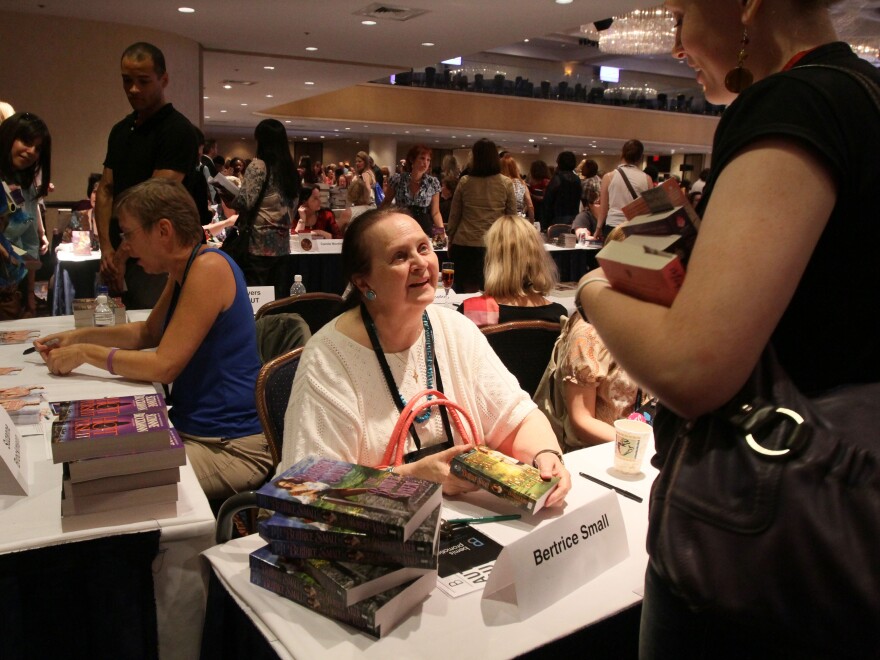 Bertrice Small chats with a fan in 2011; she was famously generous with her time and attention.