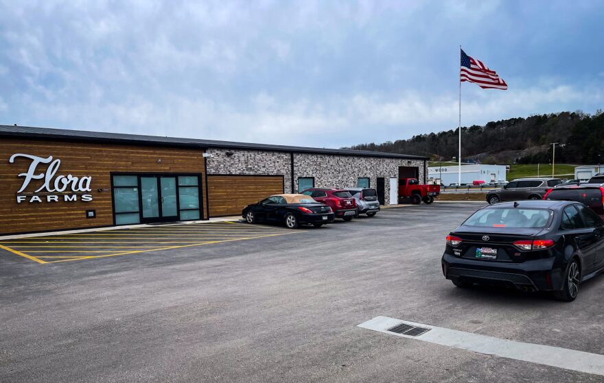 Cars park outside of Flora Farms Stateline dispensary 