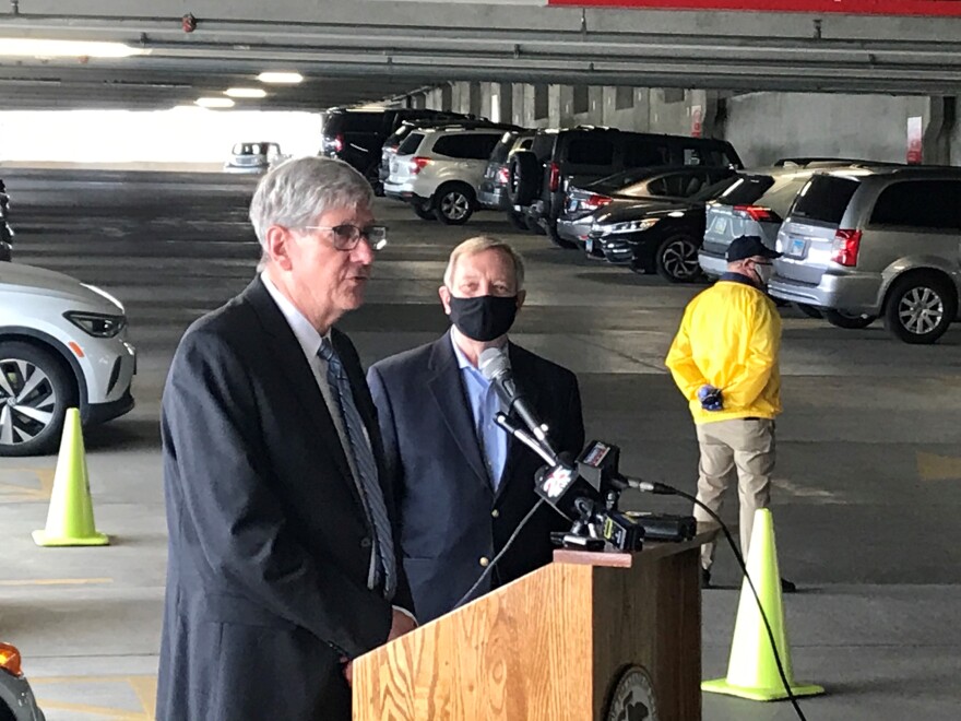 Normal Mayor Chris Koos, left, and U.S. Sen. Dick Durbin talk Thursday with reporters about the need for electric vehicle infrastructure.