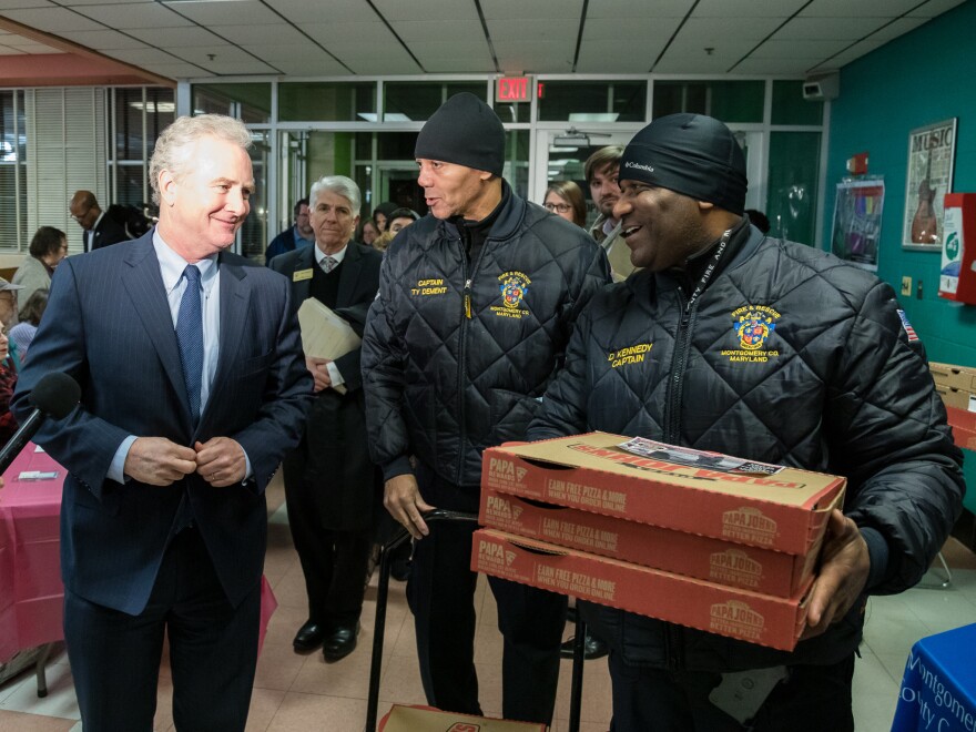 Sen. Chris Van Hollen and local firefighters showed support for furloughed workers at a community potluck.