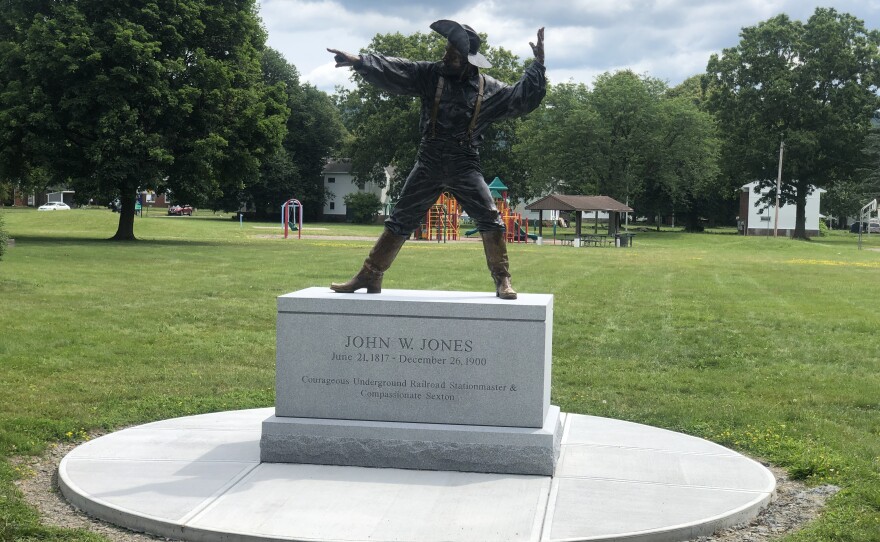 A newly commissioned bronze and brass statue of John W. Jones adorns the lawn of the museum.