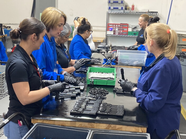 Women put together weapons parts at Azimuth Technology in Collier County. The regional trade association says manufacturing is growing in Southwest Florida, and that women are being trained for many of the new jobs.