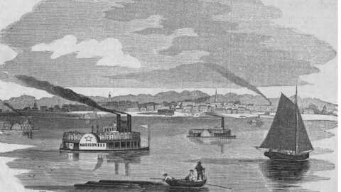 An 1854 engraving titled "View of the City of Madison, Indiana," showing several steamboats and sailboats navigating the Ohio River with the city skyline and hills in the background.