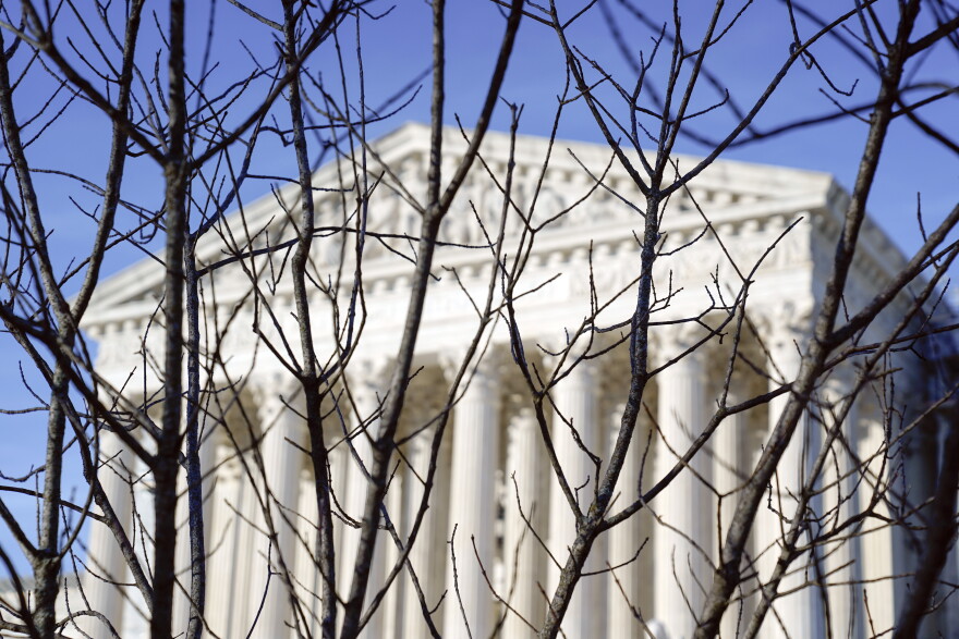 The U.S Supreme Court is photographed on Friday, Jan. 5, 2024, in Washington. The Supreme Court will decide whether former President Donald Trump can be kept off the 2024 presidential ballot because of his efforts to overturn his 2020 election loss that culminated in the U.S. Capitol attack. The justices Friday agreed to take a Colorado case, inserting themselves in the presidential campaign and acknowledging the need to decide quickly. (AP Photo/Mariam Zuhaib)