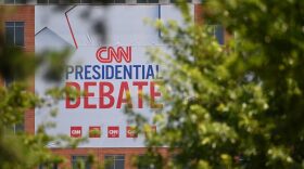 CNN signage hangs outside the studios at the Turner Entertainment Networks as Atlanta prepares one day ahead of the first 2024 presidential debate between US President Joe Biden and former President Donald Trump, on June 26, 2024. ANDREW CABALLERO-REYNOLDS/ AFP via Getty Images