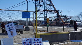 Signs left outside the main gate to Indiana Beach during the rally to save the amusement park in March.