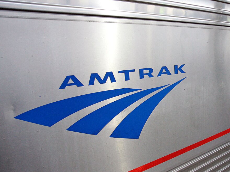 An Amtrak logo is seen on one of the system's trains