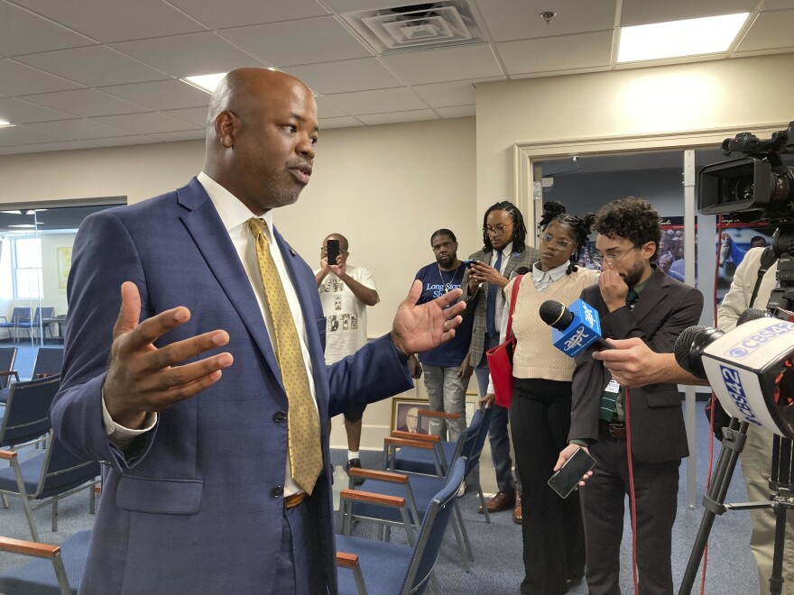 Alabama state Rep. Chris England, D-Tuscaloosa, discusses his objections to a redistricting plan for the state's seven congressional districts on Friday, July 21, 2023, at the Alabama Statehouse in Montgomery, Ala. Lawmakers are redrawing districts after courts said the current map likely violates federal law. (AP Photo/Jeff Amy)