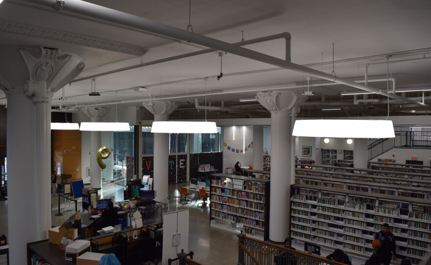 The Mitchell Street Branch has many features from the original building still intact, including the columns with carved plaster capitals. We have the original terrazzo floor. Along the mezzanine, we have the original mahogany railing.