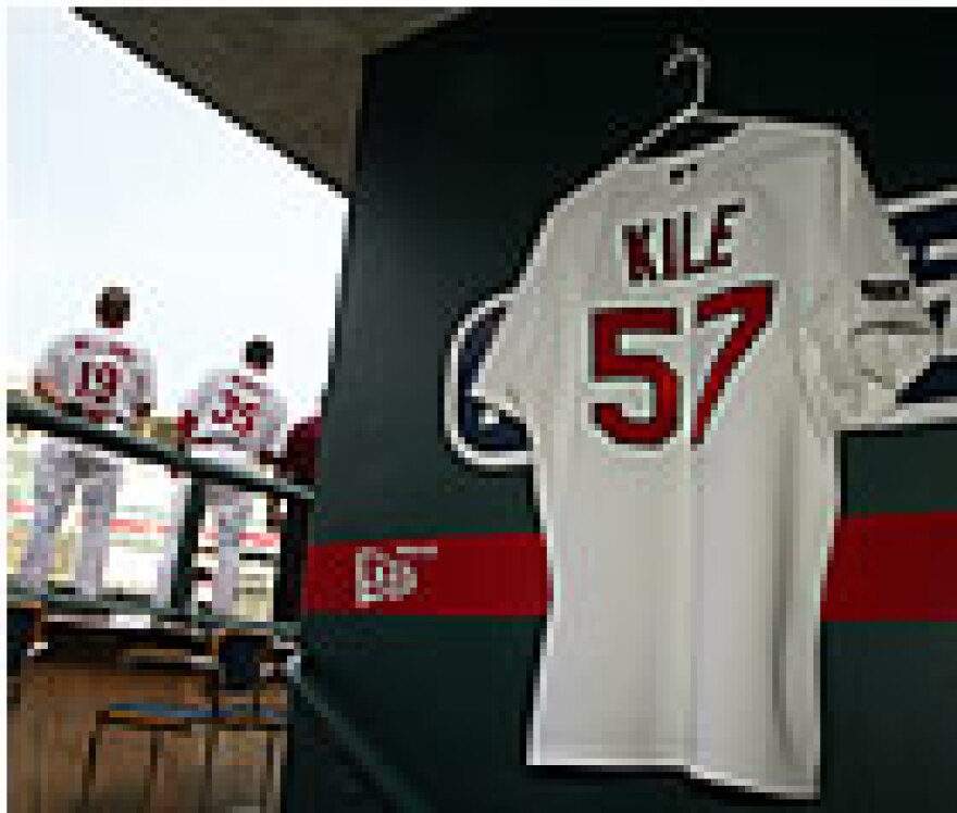 Darryl Kile's jersey hangs in the Cardinals' dugout Tuesday night (UPI photo/Bill Greenblatt)
