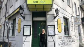 Sylvia Falkner stands in front of her Berlin pub, Metzer Eck, which has been owned by four generations of the same family since 1913. She is one of thousands of small German business owners struggling to keep their businesses open in an extended pandemic lockdown.
