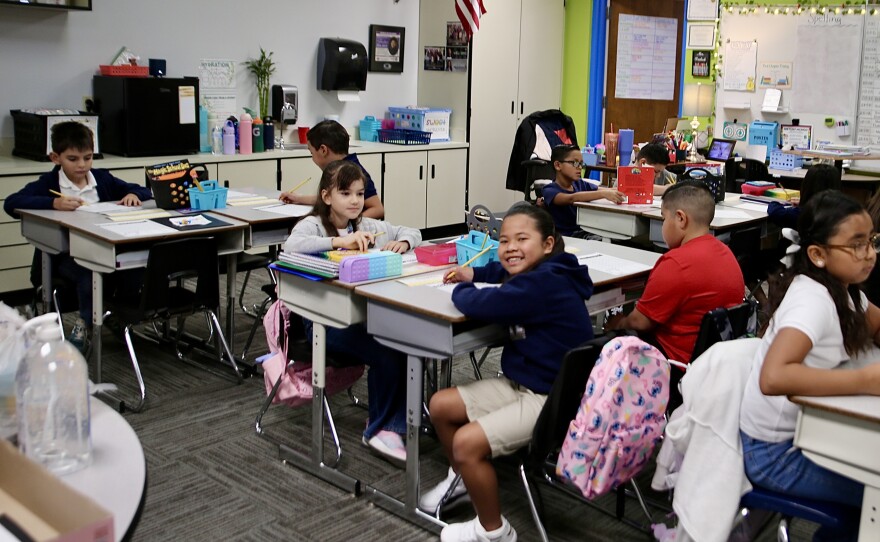 Some students, like these third graders, were all smiles first thing in the morning.