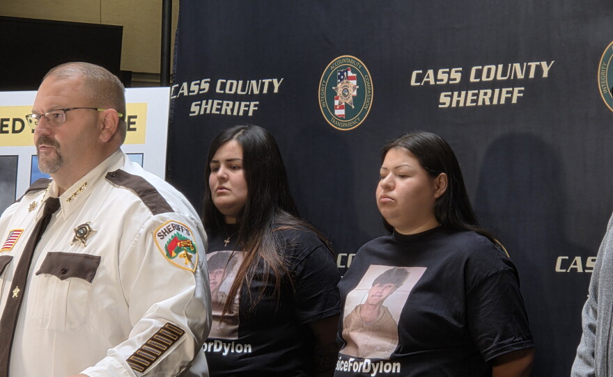 Cass County Sheriff Bryan Welk addresses the press at the Leech Lake Tribal Justice Center in Cass Lake on Oct. 7, 2026. Standing behind him are Rosa and Monica Oothoudt, the sister and cousin of 17-year-old Dylon Oothoudt.