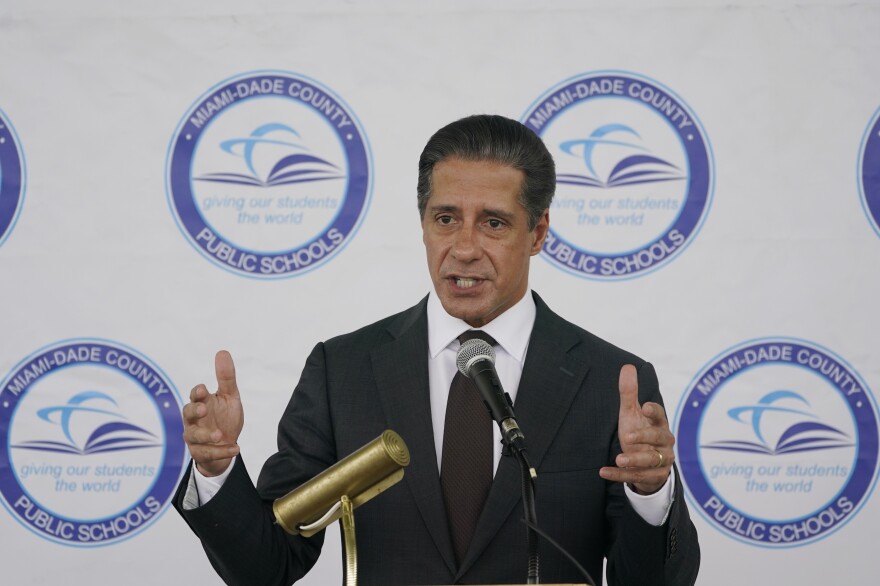 Miami-Dade County Public Schools Superintendent Alberto Carvalho speaks during a news conference before handing out COVID-19 home rapid testing supplies to representatives from different schools in the district, Thursday, May 20, 2021, at the Frederick Douglass Elementary School in the Overtown neighborhood of Miami. The school district and eMed, a local Miami telehealth company partnered to provide 1,000 free tests to students, teachers in the neighborhood. (AP Photo/Wilfredo Lee)