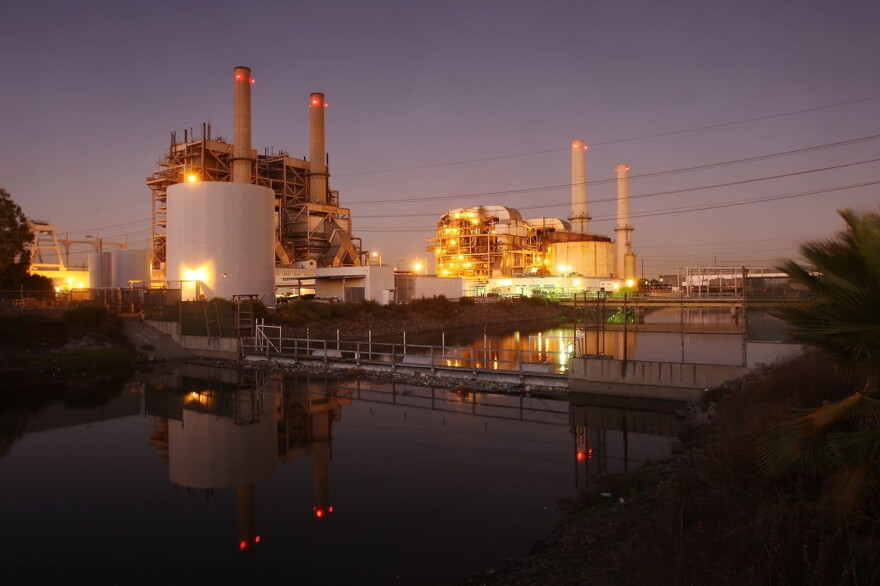 The court battle starts this week on the Obama administration's environmental regulations on greenhouse gas emissions from power plants and large industrial facilities. The photo shows the AES Corporation 495-megawatt Alamitos natural gas-fired power station on Oct. 1, 2009, in Long Beach, Calif. (David McNew/Getty Images) 