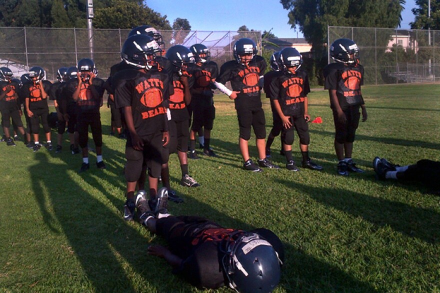 The Los Angeles Police Department helped launch the Watts Bears, a team of the Pee Wee division of Pop Warner football, in 2012. The players come from the neighborhood and practice at a park that's considered a neutral site between local gangs.