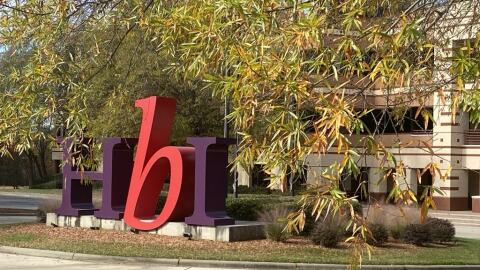 The HanesBrands logo in front of corporate offices in Winston-Salem. PAUL GARBER/WFDD